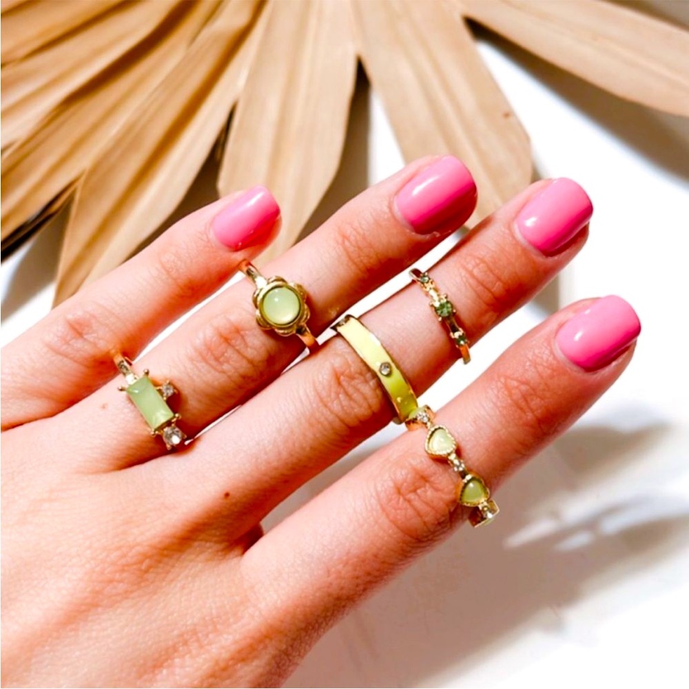 SOLD Anthropologie Gold Rings with Light Green Accents